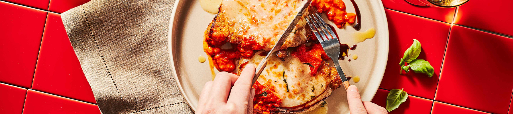 Chicken parmesan with tomato sauce and melted cheese